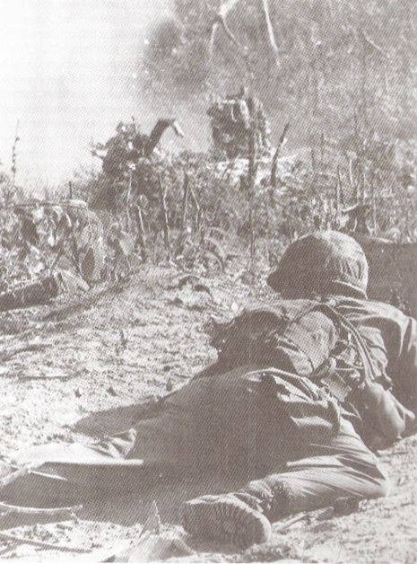 Paratroopers taking fire from Vietcong during Operation Hump (Photo Wikimedia Commons)