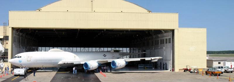 An E-6B Mercury is being moved into a Hanger at the Boeing Aerospace Support Center, Cecil Field Fla., to be retrofitted with a new cockpit and an advanced communications package in April 2003. (US Navy photo)