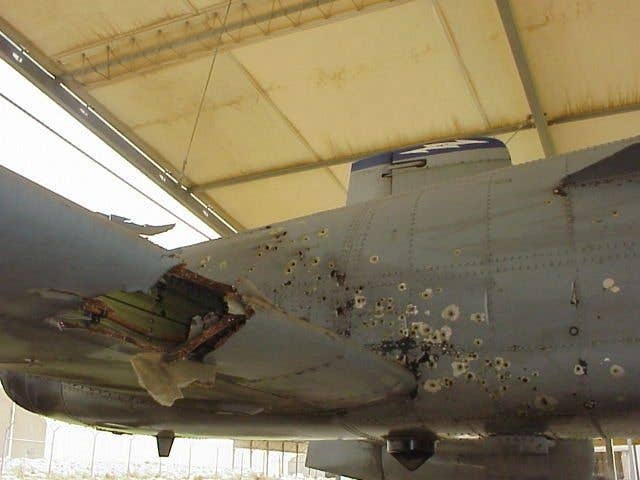 The A-10 Thunderbolt II piloted by Captain Kim Campbell suffered extensive damage during Operation Iraqi Freedom in 2003. Campbell flew it safely back to base on manual reversion mode after taking damage to the hydraulic system. (Photo courtesy of U.S. Air Force)