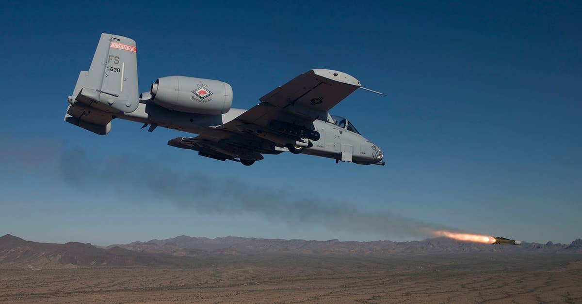 An A-10 launches an AGM-65 Maverick air-to-surface missile during a training mission. The missile enables the A-10 to destroy armored vehicles and other targets from a standoff position. (Photo from U.S. Air Force)