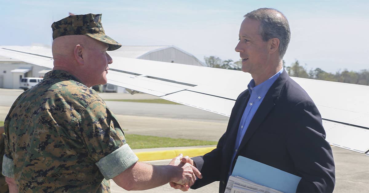 Maj. Gen. Walter L. Miller Jr. (left) the commanding general of II Marine Expeditionary Force, welcomes Rep. Mac Thornberry (right) at Marine Corps Air Station New River, N.C., March 18, 2016. Thornberry met with senior leaders and junior Marines from units with II MEF to discuss readiness, personnel, and equipment-related issues. (U.S. Marine Corps photo by Cpl. Lucas Hopkins)