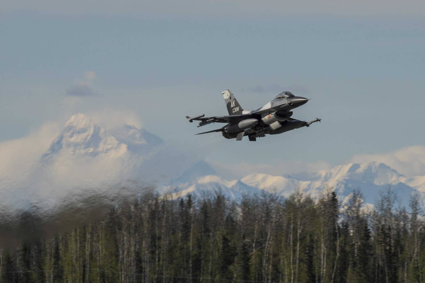 A U.S. Air Force F-16 Fighting Falcon assigned to the 18th Aggressor Squadron at Eielson Air Force Base, Alaska, May 4, 2016, takes off from the base during RED FLAG-Alaska (RF-A) 16-1. Aggressor pilots are trained to act as opposing forces in exercises like RF-A to better prepare U.S. and allied forces for aerial combat. (U.S. Air Force photo by Staff Sgt. Joshua Turner)