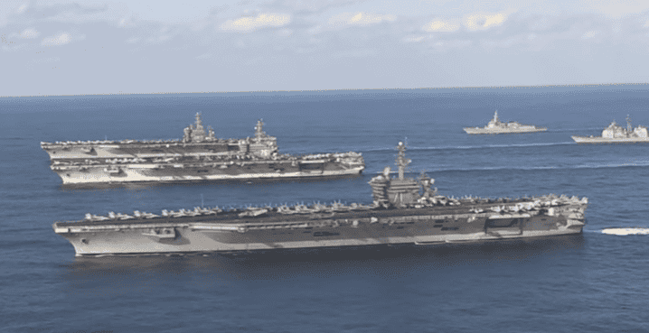 From back to front, the Nimitz-class nuclear-powered aircraft carriers USS Nimitz (CVN 68), USS Ronald Reagan (CVN 76), and USS Theodore Roosevelt (CVN 71). (Youtube screenshot)