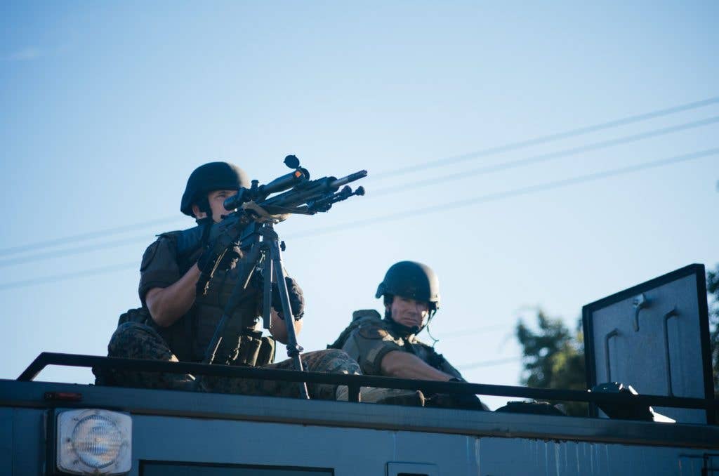 Sharpshooters in Ferguson, Missouri, wait for violence to break out at protests after the verdict was read in the the Michael Brown death case. The United States has four cities on the list of most dangerous places in the world. (image Wiki)