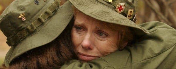 Female Vietnam Veterans hug on Veteran's Day, year unknown. Some 11,000 women served in Vietnam.