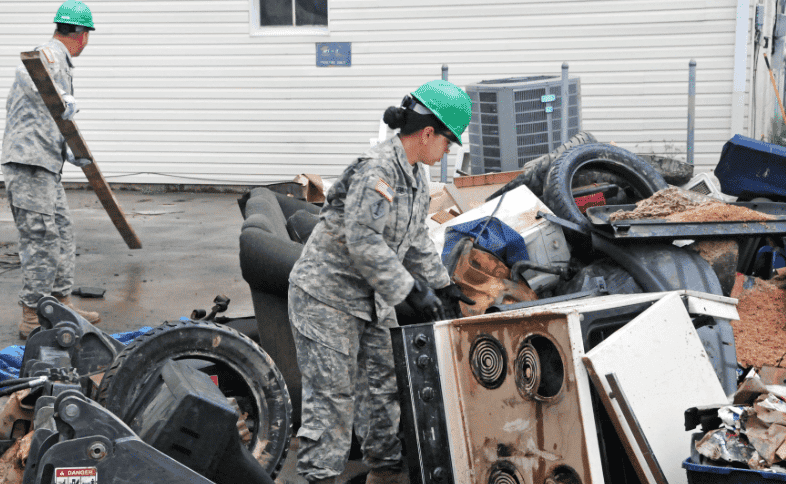 When you get caught leaning so hard, you have to wear a hard hat to clean up. (Source: DoD)