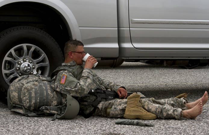 soldier sitting down without boots