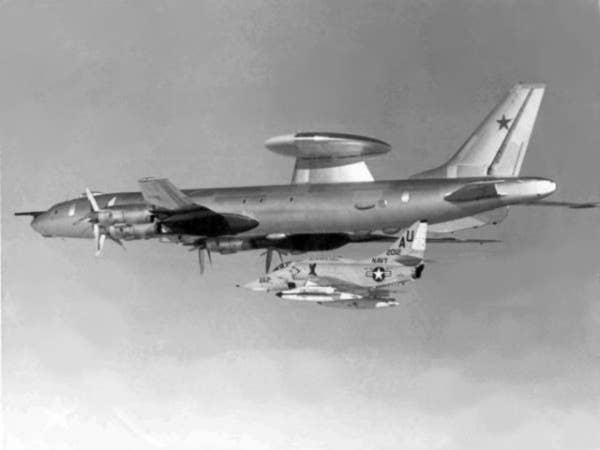 A Tu-126 Moss is intercepted by a U.S. Navy A-4. (Photo from U.S. Navy)