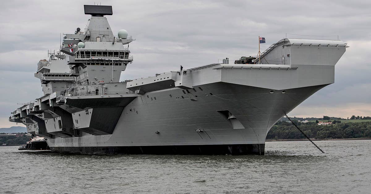 Pictured is HMS Queen Elizabeth under anchor. (UK Ministry of Defense Photo)