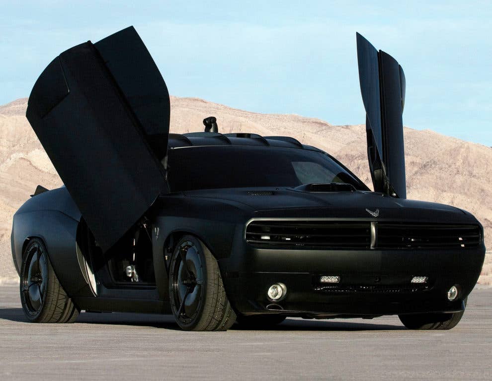 The stealth-black Air Force Challenger 'Vapor' features a biometric access to open the vertical doors, a custom stealth body kit with jet enhancements and a carbon fiber exterior trim. Other exterior components include one-off carbon fiber wheels, a custom stealth exhaust mode that allows the vehicle to run in complete silence or the headers can be opened facilitate the aggressive sound of the engine. The vehicle features a shaker hood, radar-absorbing paint, proximity sensors and a 360-degree camera with a quarter-mile range. The Vapor is one of the Air Force's newest mobile marketing assets and will be touring high schools and a variety of Air Force sponsored events as part of the 2009 Super Car Tour. (U.S. Air Force photo/Master Sgt. Scott Reed)
