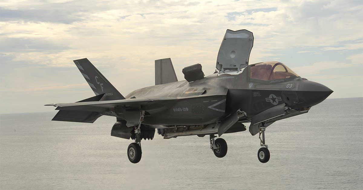 A F-35B Lightning II hovers before landing aboard the USS America (LHA 6) during the Ligthning Carrier Proof of Concept Demonstration, November 19, 2016. Marine Corps F-35s could be deployed on HMS Queen Elizabeth. (U.S. Marine Corps Photo by Cpl. Thor Larson)