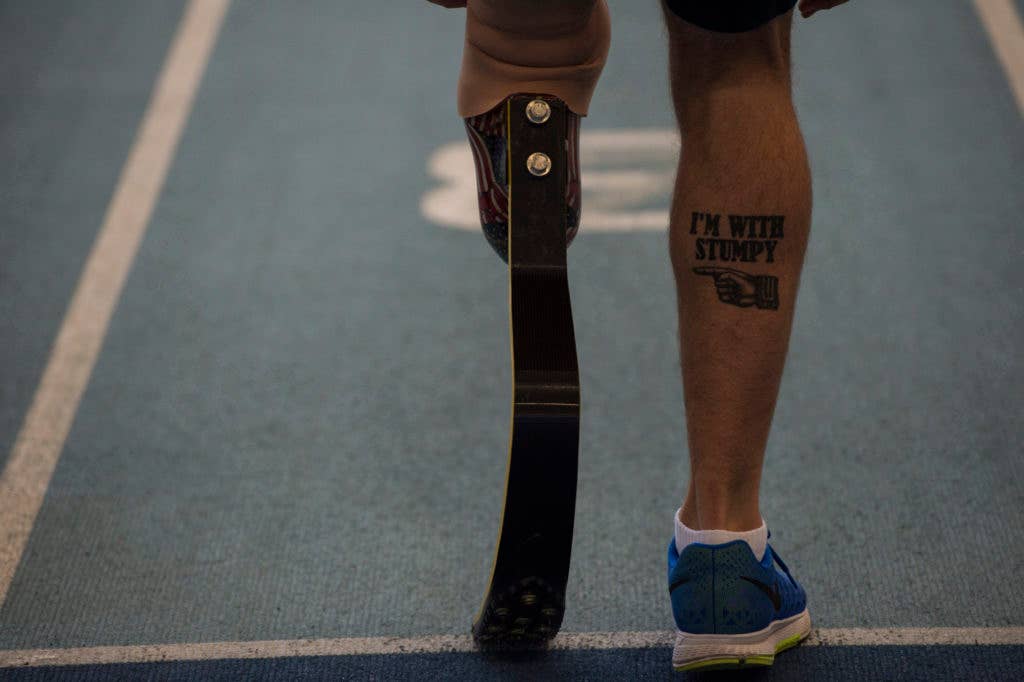 U.S. Navy Hospital Corpsman 3rd Class Redmond Ramos warms up before competing in the athletics portion of the Invictus Games at the Lee Valley Athletics Centre in London Sept. 11, 2014. (DoD photo by Senior Airman Tiffany DeNault, U.S. Air Force/Released)