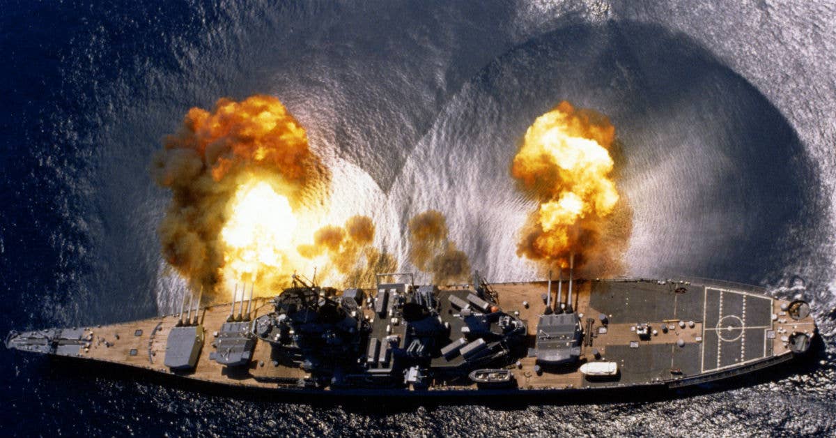 USS Iowa (BB-61) fires a full broadside of her nine 16″/50 and six 5″/38 guns during a target exercise near Vieques Island, Puerto Rico. Photo from DoD.