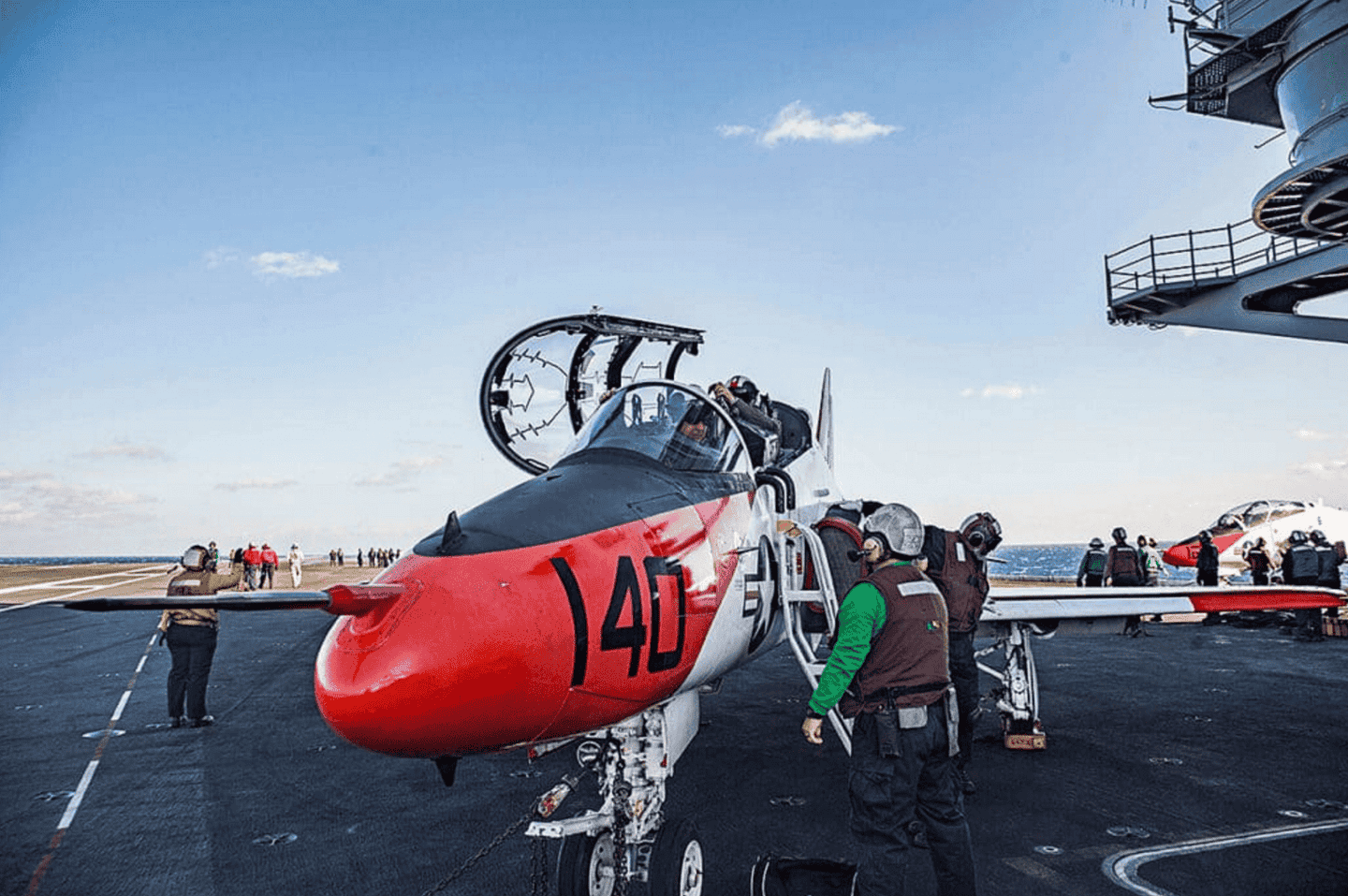 Student pilots prepare to exit a T-45C Goshawk assigned to Carrier Training Wing (CTW) 2 on the flight deck of the aircraft carrier USS Dwight D. Eisenhower (CVN 69). (U.S. Navy photo by Mass Communication Specialist Seaman Zach Sleeper)