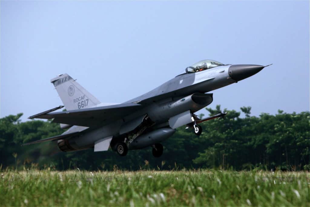 A US supplied F-16 fighter takes off from Chiayi Airbase in Southern Taiwan. These jets patrol the boundary in the strait across from China. (Photo from Wikimedia Commons)