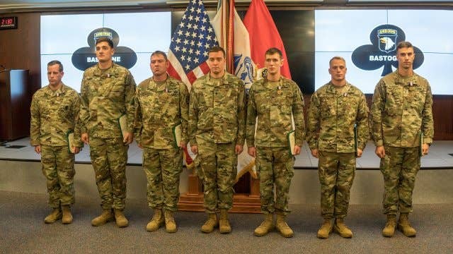 Six Soldiers from 1st Brigade Combat Team, 101st Airborne Division (Air Assault), received the Soldier's Medal, Nov. 28, during a ceremony held at the 101st ABN DIV (AASLT) headquarters. The Soldiers earned the highest peacetime award for valor for their life-saving actions following a UH-60 Blackhawk helicopter crash, Jan. 31. Gen. Mark A. Milley, Army chief of staff, took time from his Fort Campbell visit to honor the six heroic Soldiers who saved the lives of the helicopter crew that day. (Photo Credit: U.S. Army photo by Spc. Patrick Kirby, 40th Public Affairs Detachment)