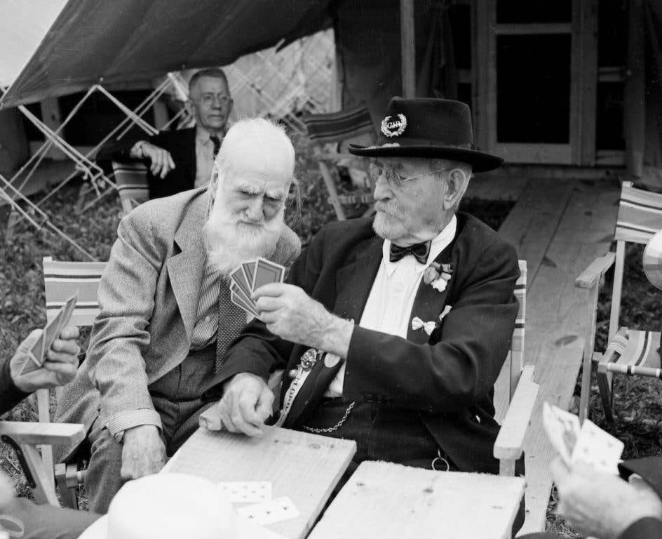 Elderly Civil War veterans playing cards together, 1930.