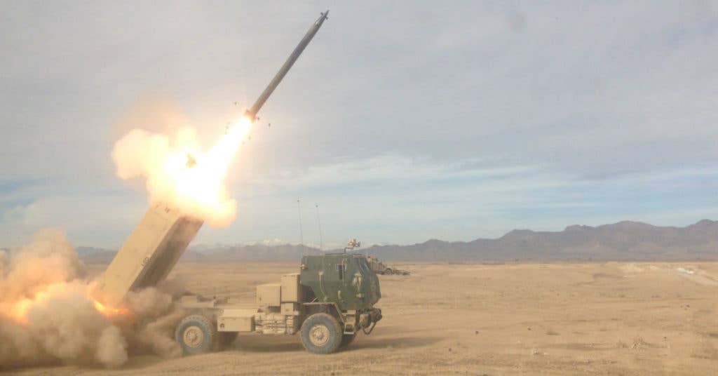 Firing a M142 HIMARS. Photo by Sgt. Toby Cook.