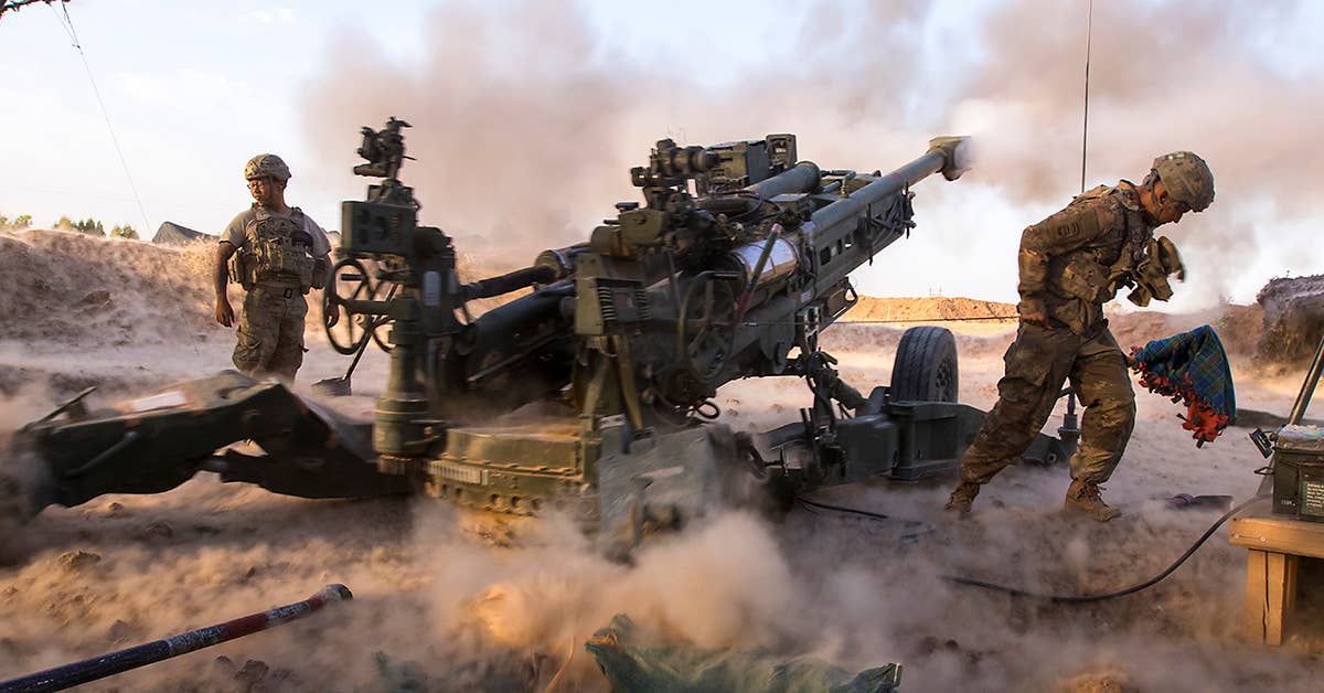Paratroopers, with Charlie Battery, 2nd Battalion, 319th Airborne Field Artillery Regiment, 82nd Airborne Division, engage ISIS militants with precise and strategically placed artillery fire in support of Iraqi and Peshmerga fighters in Mosul. Army Photo by Sgt. Christopher Bigelow.