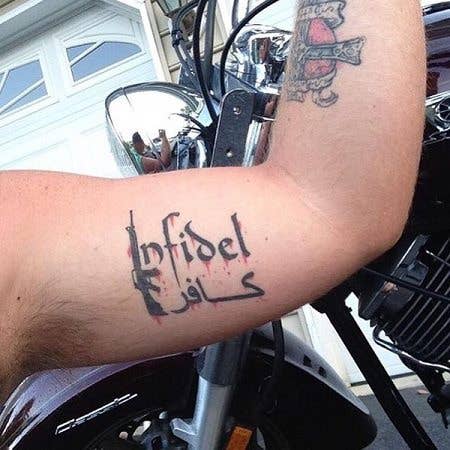 But when a infidel tattoo is right next to a cross...you can see the irony, right? (Image via Reddit)
