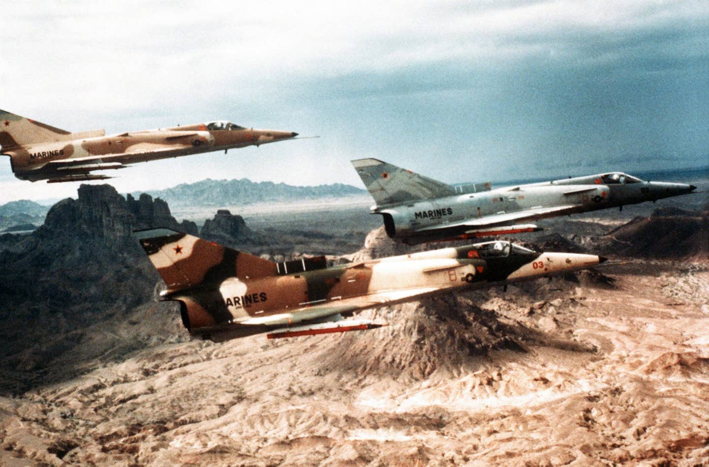 Three F-21 Kfirs in flight, arguably Israel's ultimate version of the Mirage III family. (USMC photo)