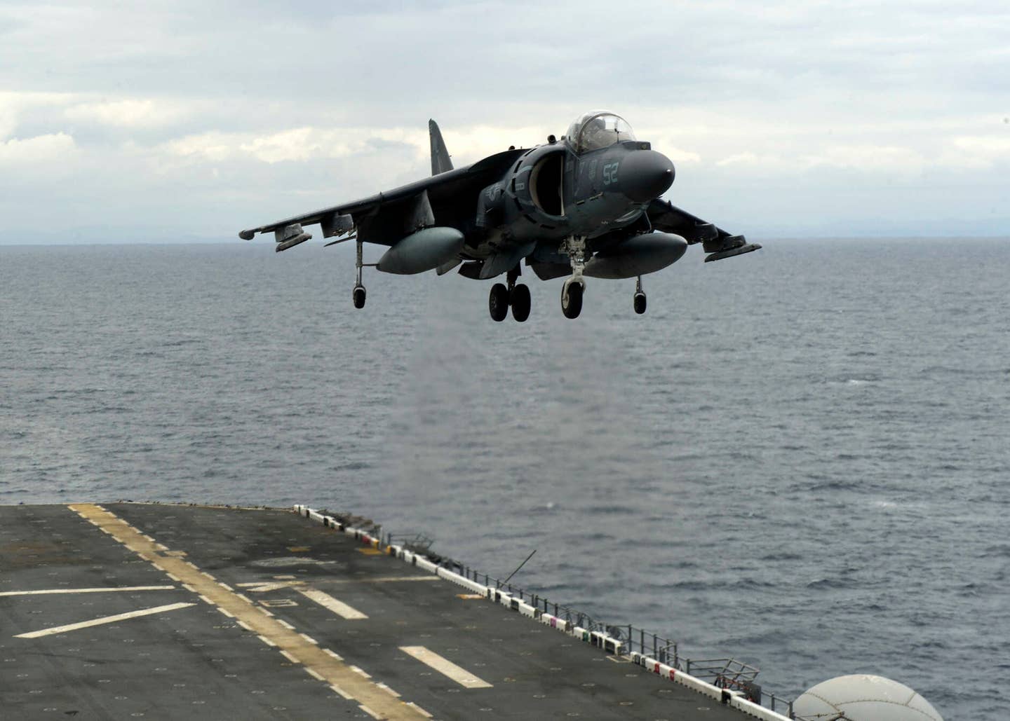 An AV-8B Harrier assigned to Marine Attack Squadron (VMA) 311 lands on amphibious assault ship USS America (LHA 6). The program that created the Harrier came out of the ZeLL experiments. (U.S. Navy photo by Mass Communication Specialist 1st Class Michael McNabb/Released)