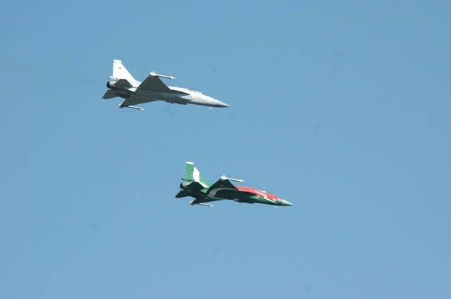 Two JF-17 Thunders in formation. (Wikimedia Commons photo by Faizanbokhari)