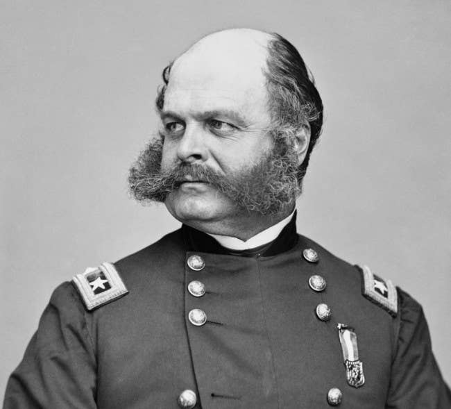Burnside is the namesake of the — wait for it — sideburn. Pure genius. And that medal adorning his chest is most certainly for "visage gallantry in the face of extreme danger."