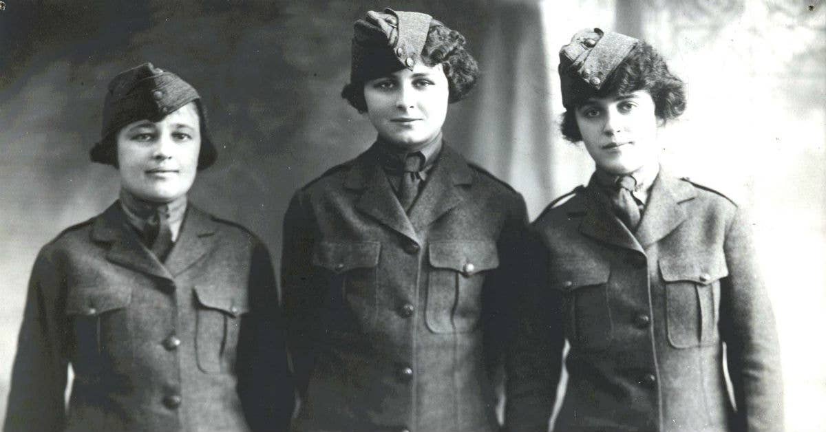 Early female Marines (left to right) Private First Class Mary Kelly, May O'Keefe, and Ruth Spike. Photo courtesy of USMC.