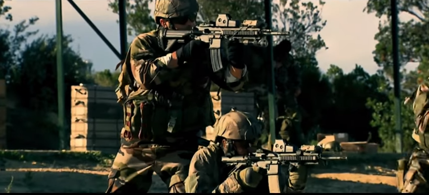 Members of France's special forces fire their HK416 rifles. (Youtube screenshot)