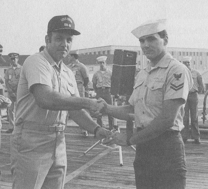 Moosally presenting Hartwig with a duty award during the summer of 1988. (Photo: U.S. Navy)