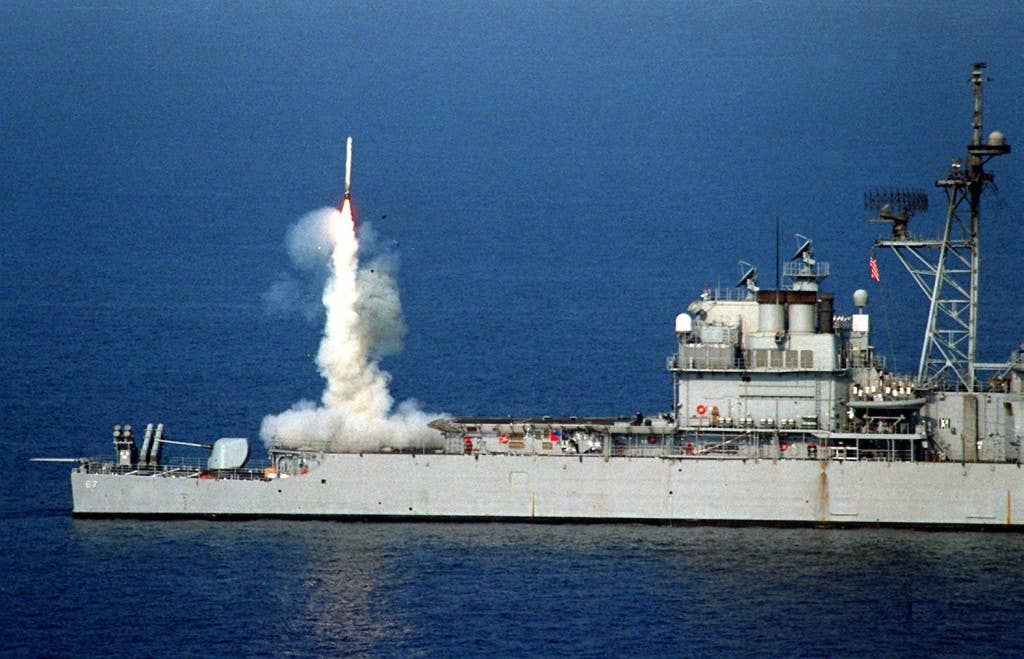 A Tomahawk missile launches from the stern vertical launch system of USS Shiloh (CG 63) (U.S. Navy photo)
