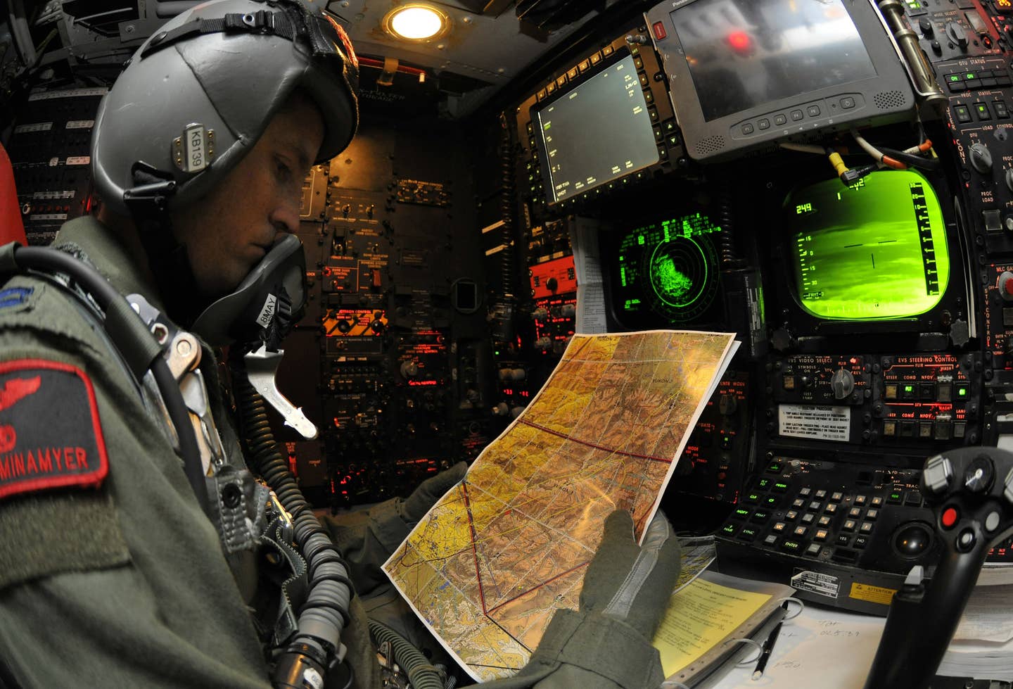 Capt. Michael Minameyer reviews map during a RED FLAG-Alaska 10-2 sortie on a B-52H Stratofortress, April 29, 2010, Eielson Air Force Base, Alaska. RF-A provides participants 67,000 square miles of airspace, more than 30 threat simulators, one conventional bombing range and two tactical bombing ranges containing more than 400 different types of targets. Captain Minameyer is a navigator assigned to the 96th Bomb Squadron, Barksdale AFB, Louisiana. (U.S. Air Force photo/Staff Sgt. Christopher Boitz)