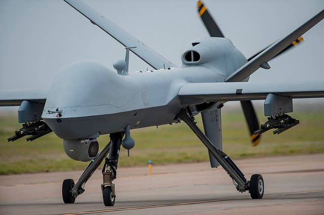 An MQ-9 Reaper performs a low pass during a first-ever air show demonstration May 29, 2016, at Cannon Air Force Base, N.M. The 2016 Cannon Air Show highlights the unique capabilities and qualities of Cannon's Air Commandos and also celebrates the long-standing relationship between the 27th Special Operations Wing and the High Plains community. (U.S. Air Force photo/Master Sgt. Dennis J. Henry Jr.)