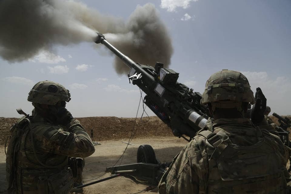 US Soldiers calibrate their weapons in Iraq on May 23, 2016. The weapons will be used to protect coalition forces and support Iraqi Army advances. (Photo: US Army Sgt. Paul Sale)