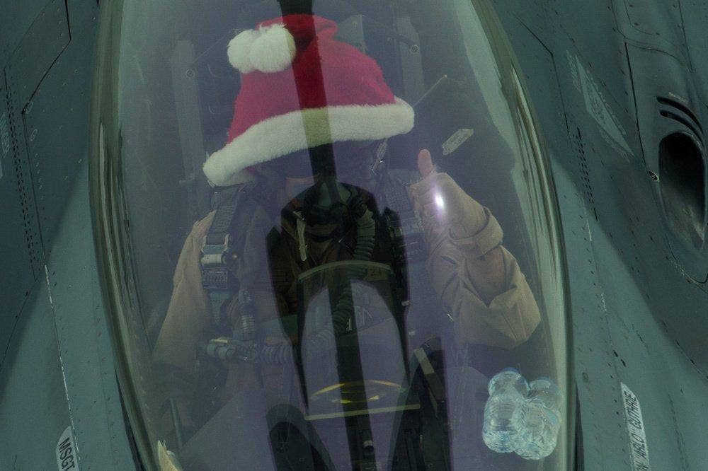 A US F-16 pilot over Iraq wears a Santa hat during strikes against ISIS on Christmas Day, December 25, 2016. US Defense Department photo.