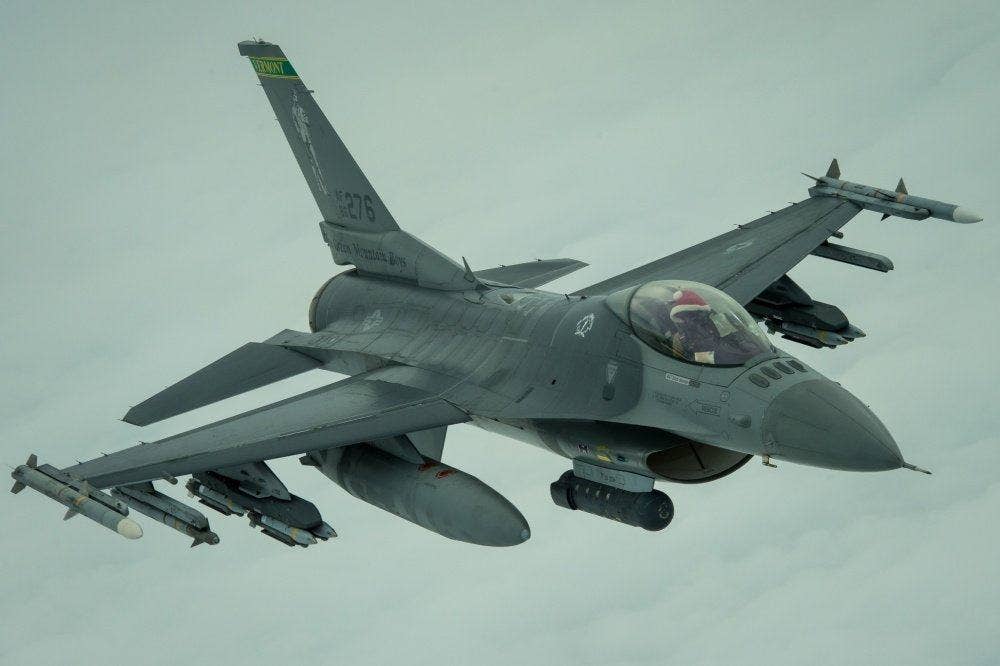 An F-16 pilot over Iraq can been seen wearing a Santa hat during a Christmas Day operation, December 25, 2016. US Defense Department photo.