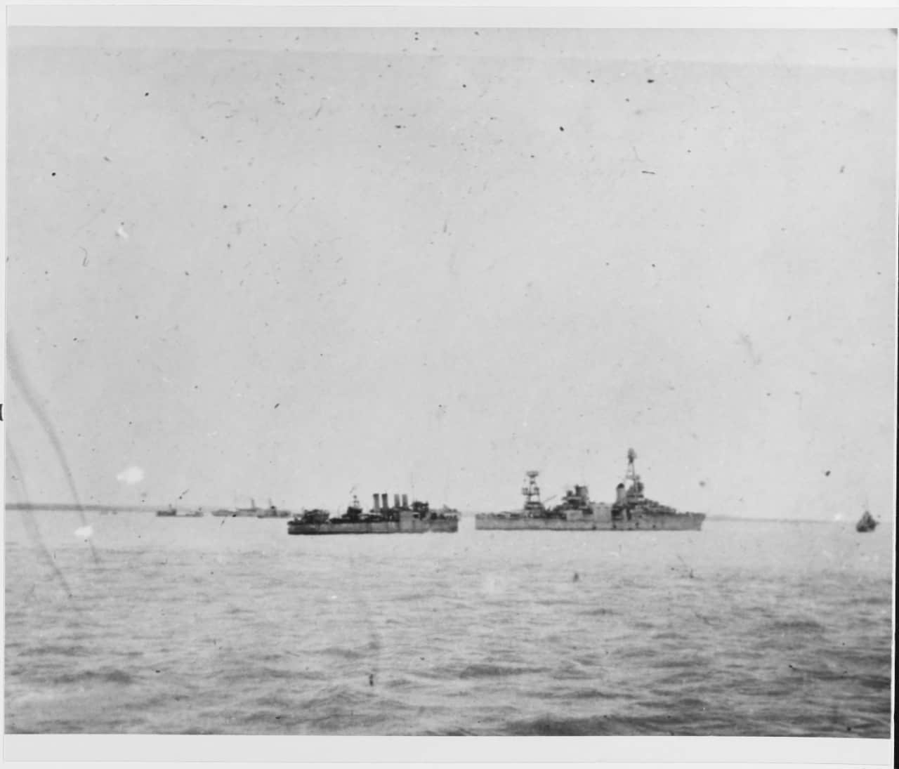 At Darwin, Australia, probably on 15 or 18 February 1942. The destroyer astern of Houston may be USS Peary (DD-226). Among the ships in the background, to the left, are HMAS Terka and the SS Zealandia. (US Navy)
