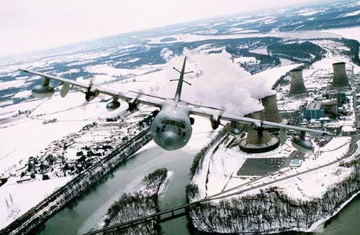 Flying over the Pennsylvania countryside in a training mission, the EC-130E/J Commando Solo is a specially-modified four-engine Hercules transport that conducts information operations, psychological operations and broadcasts information in various frequencies. The 193rd Special Operations Wing, Harrisburg International Airport, Pa., has total responsibility for the Commando Solo missions. (U.S. Air Force photo)