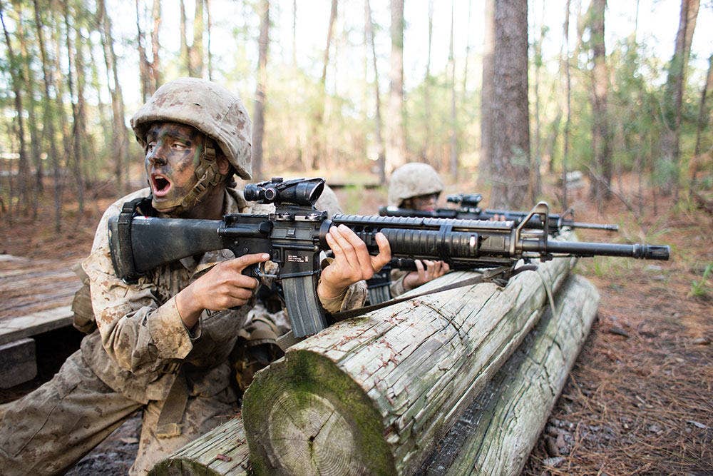 Rct. Maria Daume, Platoon 4001, Papa Company, 4th Recruit Training Battalion, yells orders to her team during the Crucible Jan. 5, 2017, on Parris Island, S.C. (U.S. Marine Corps photo by Staff Sgt. Greg Thomas)
