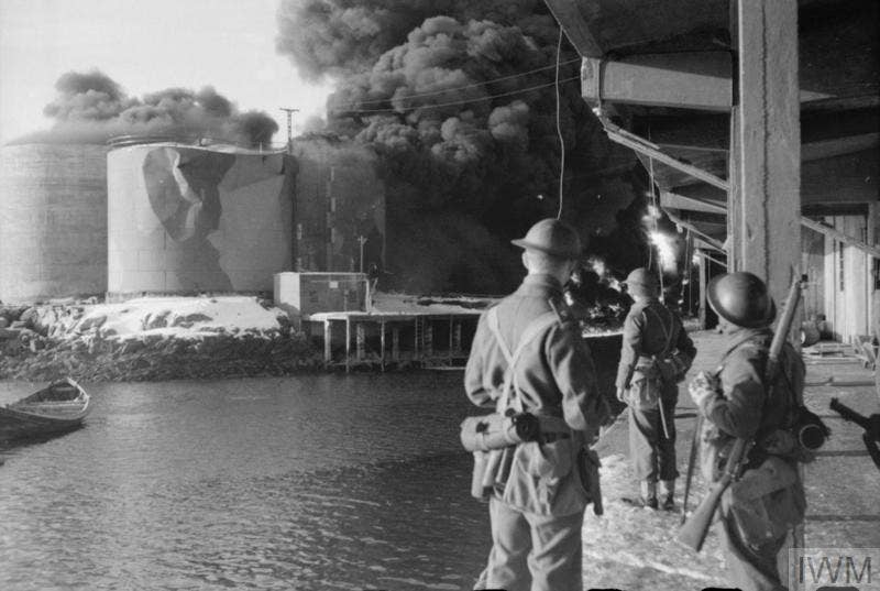 British commandos burn fish oil facilities in the Lofoten Islands in World War II. (Photo: War Office Capt. Tennyson d'Eyncourt, Imperial War Museum)