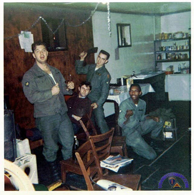 U.S. Soldiers hanging out in a barracks day room in 1968.