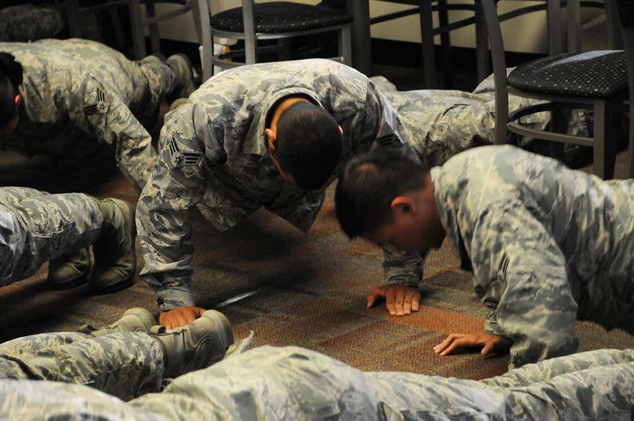 Airmen from Schriever Air Force Base in Colorado participate in 22Kill's 22 Pushup Challenge. (U.S. Air Force photo)