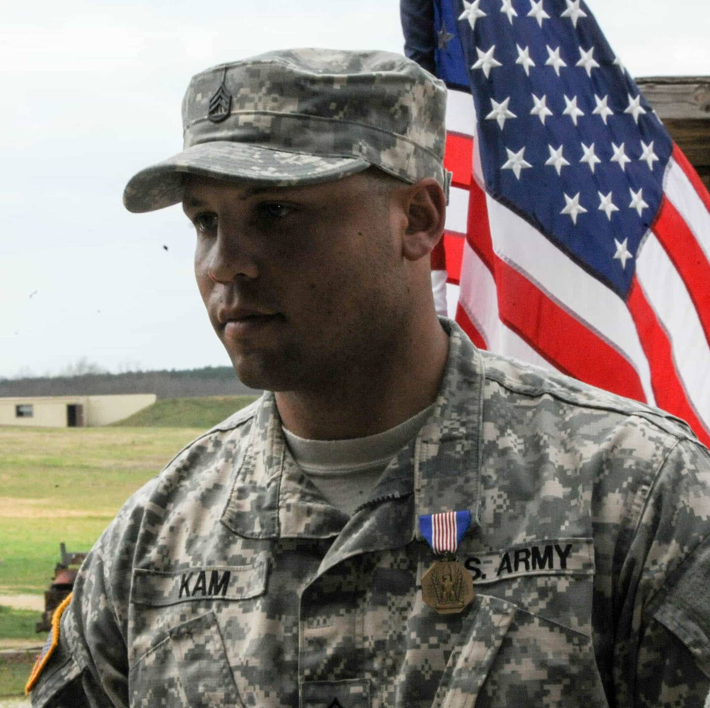 Staff Sgt. Kenneth Kam, Combat Training Company, with his Soldier's Medal. (US Army photo)