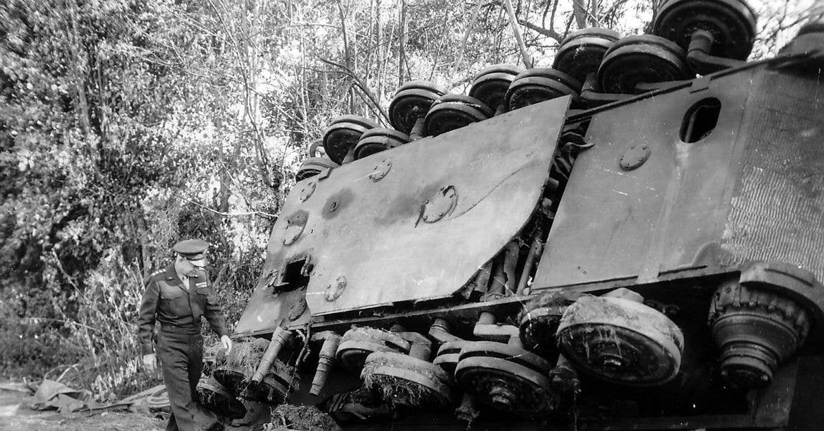 general eisenhower reviews tank damage