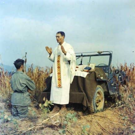 Chaplain Emil Kapaun celebrates a Catholic Mass for cavalry soldiers during the Korean War (Photo US Army)