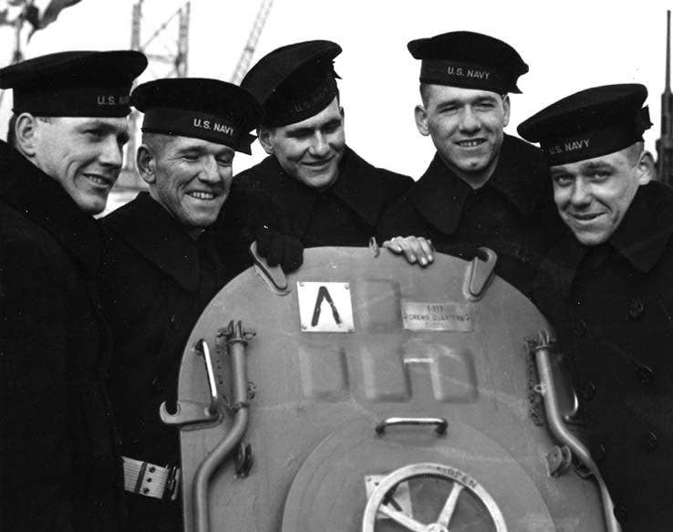 The Sullivan brothers pose on the USS Juneau. Photo: US Navy