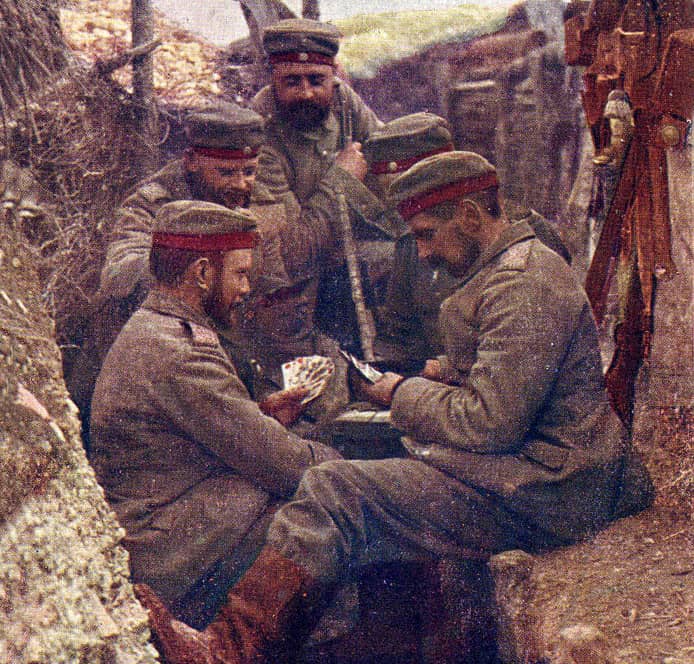 German soldiers playing cards on the Western front in the summer of 1916. (Playing Card Museum)