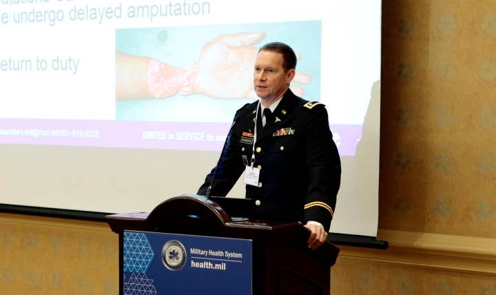 Army Lt. Col. David Saunders, talks about extremity regeneration at the Military Health System Research Symposium in Kissimmee, Florida, Aug. 28, 2017. (DOD photo)