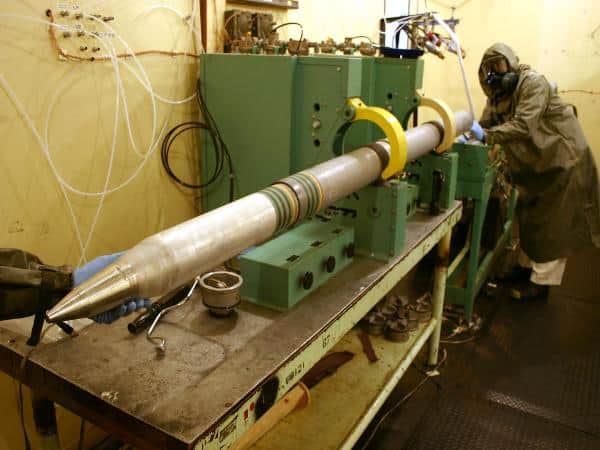 An M55 rocket being disassembled at Umatilla Chemical Depot. This was one delivery system for VX, a very deadly nerve agent. (US Army photo)
